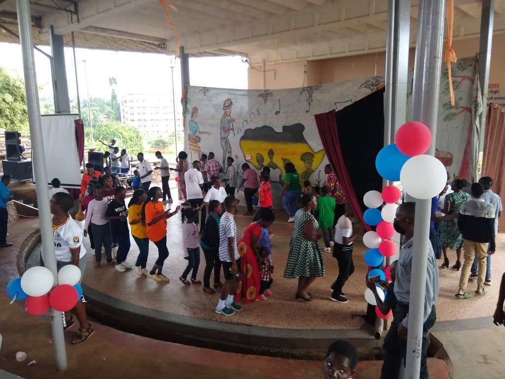 Children and caregivers at an HHVU activity in 2024